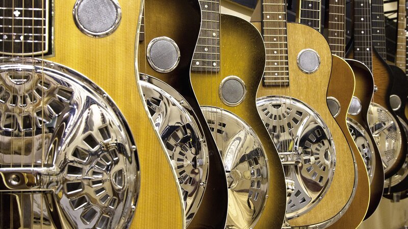 Row of resonator guitars