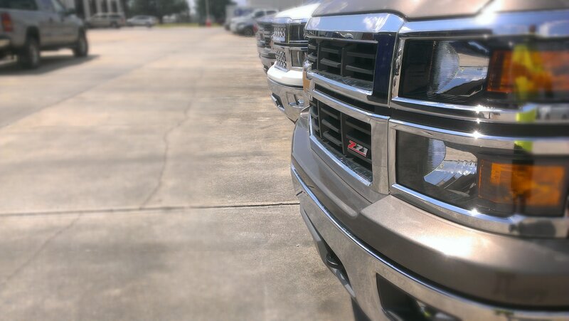 Row of Silver Trucks