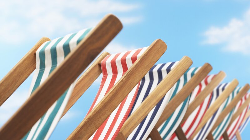 Row of striped deck chairs