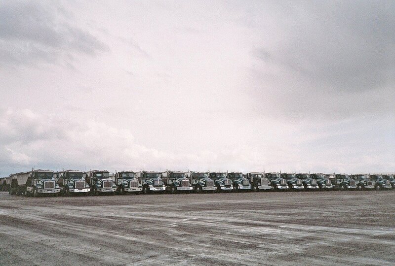 Row of trucks in a lot