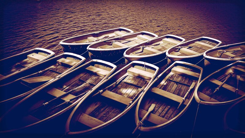 Rowboats on Water — Brown