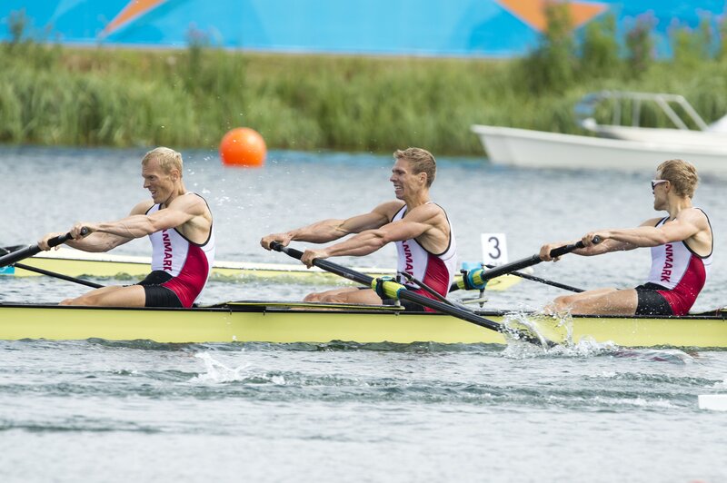 Rowers in a yellow boat