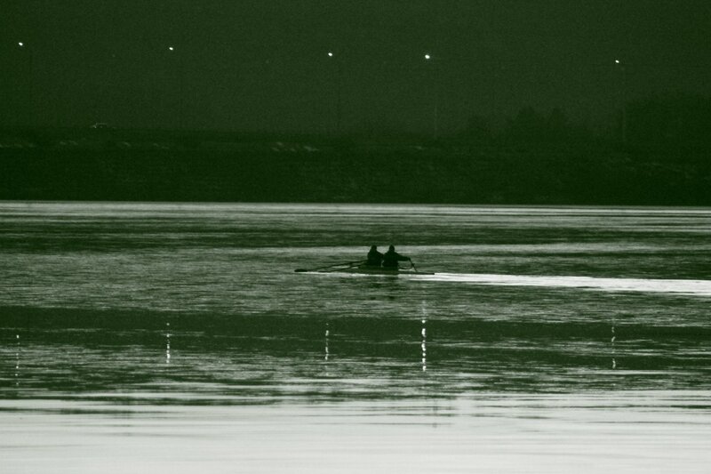 Rowers on a calm river