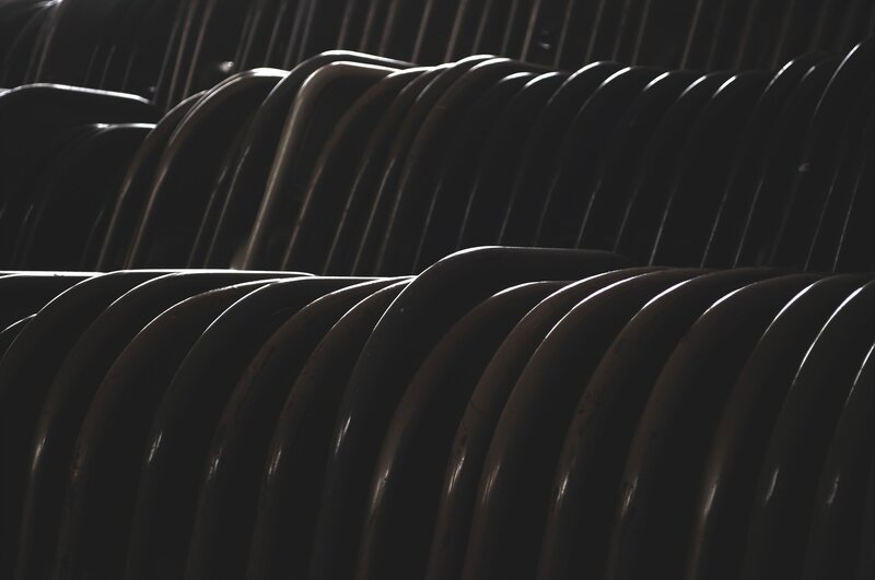 Rows of empty chairs in shadow