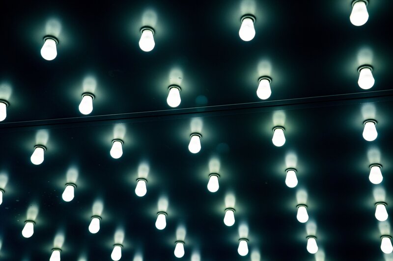Rows of glowing light bulbs
