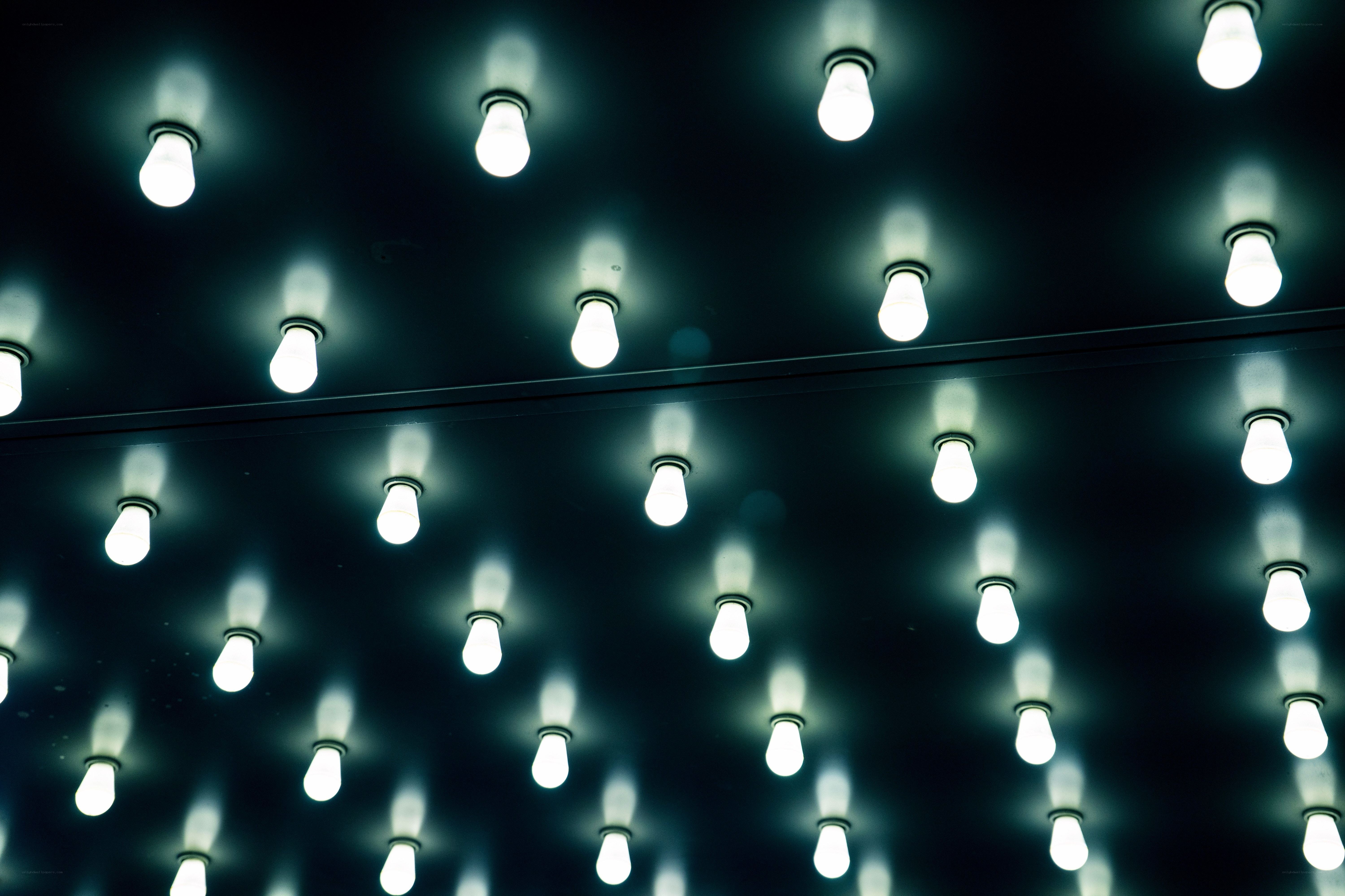 Rows of glowing light bulbs