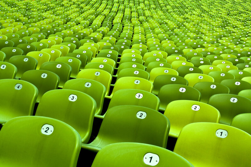 Rows of green stadium seats