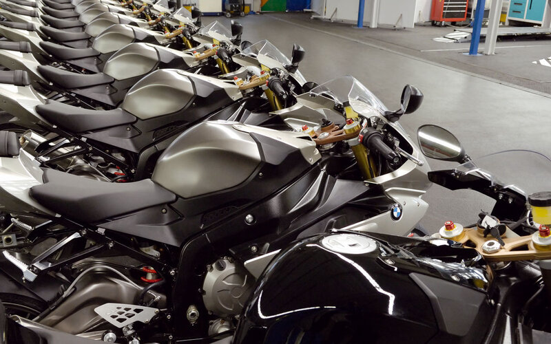 Rows of motorcycles in a factory