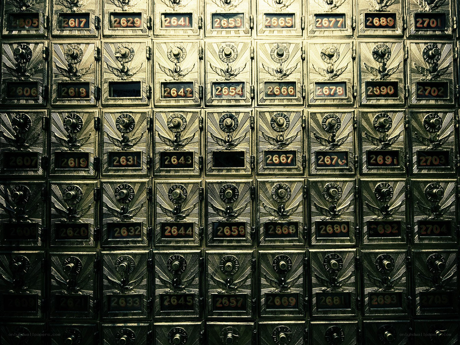 rows of numbered safe deposit boxes