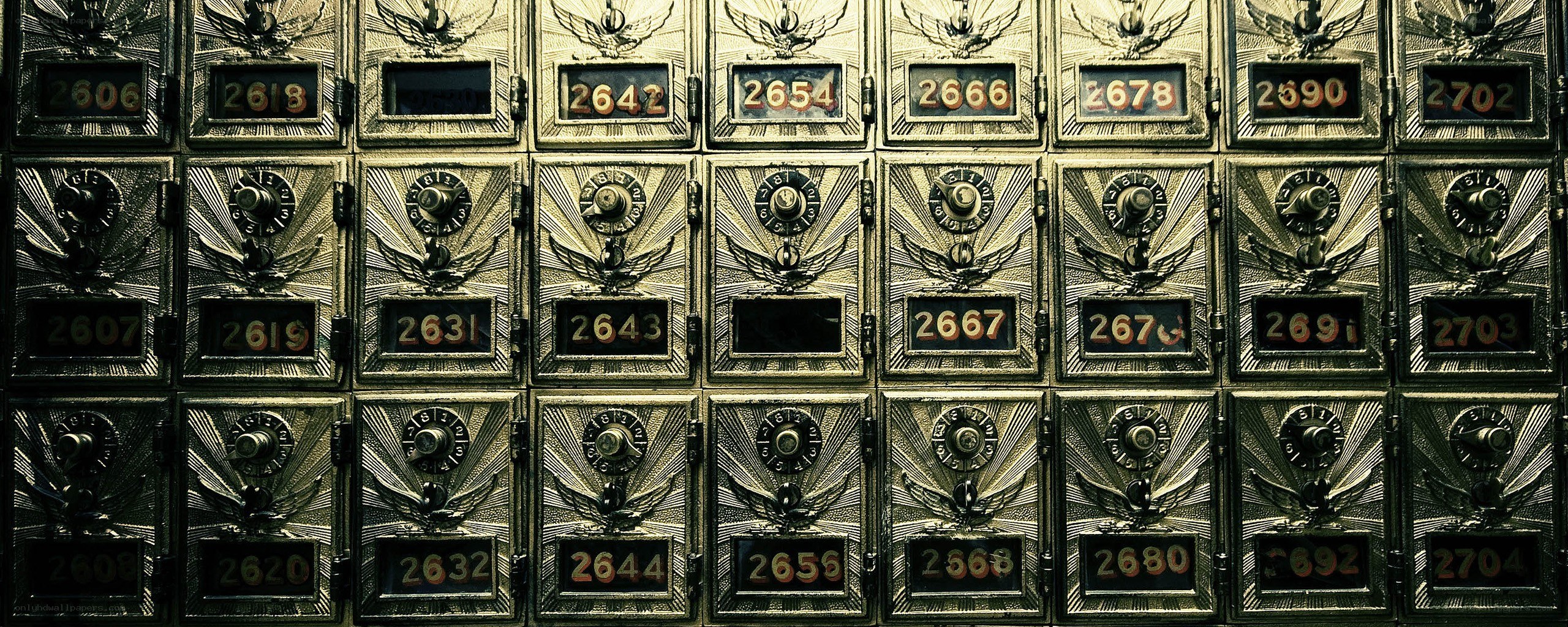 rows of numbered safe deposit boxes