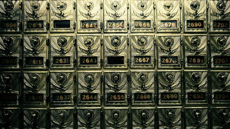 Rows of numbered safety deposit boxes