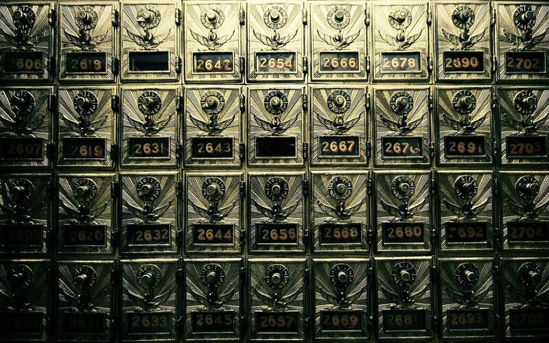 rows of old safe deposit boxes