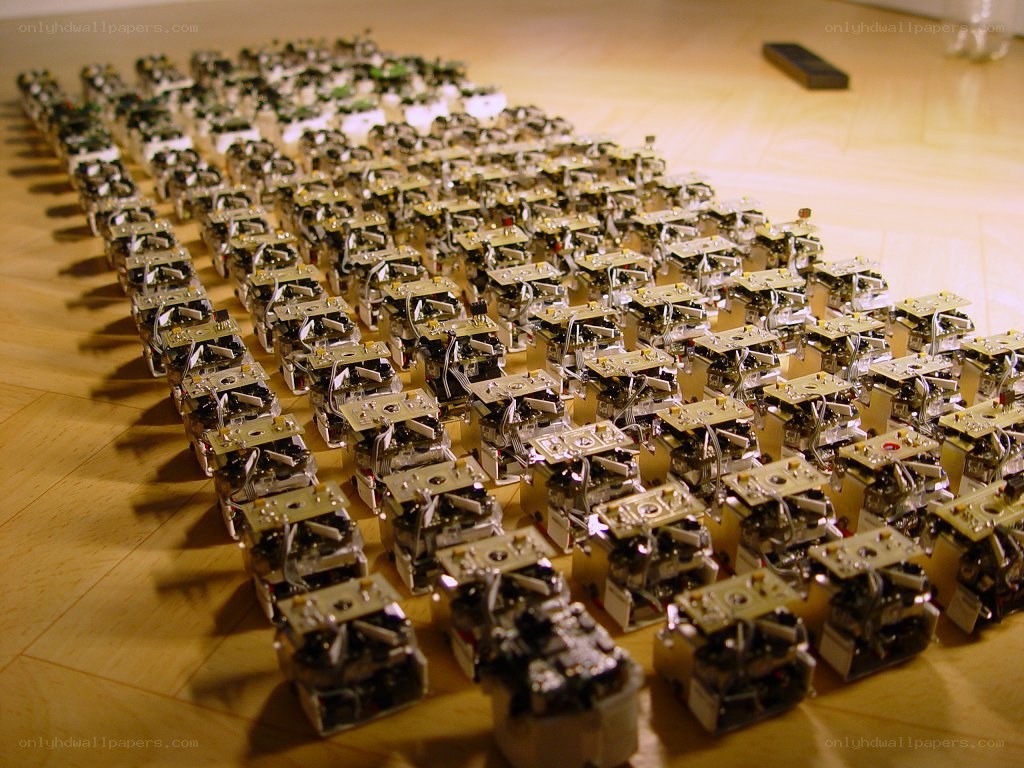 Rows of robotic devices on floor