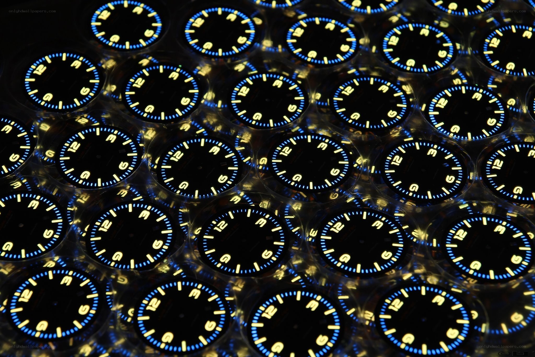 Rows of watch dials in packaging