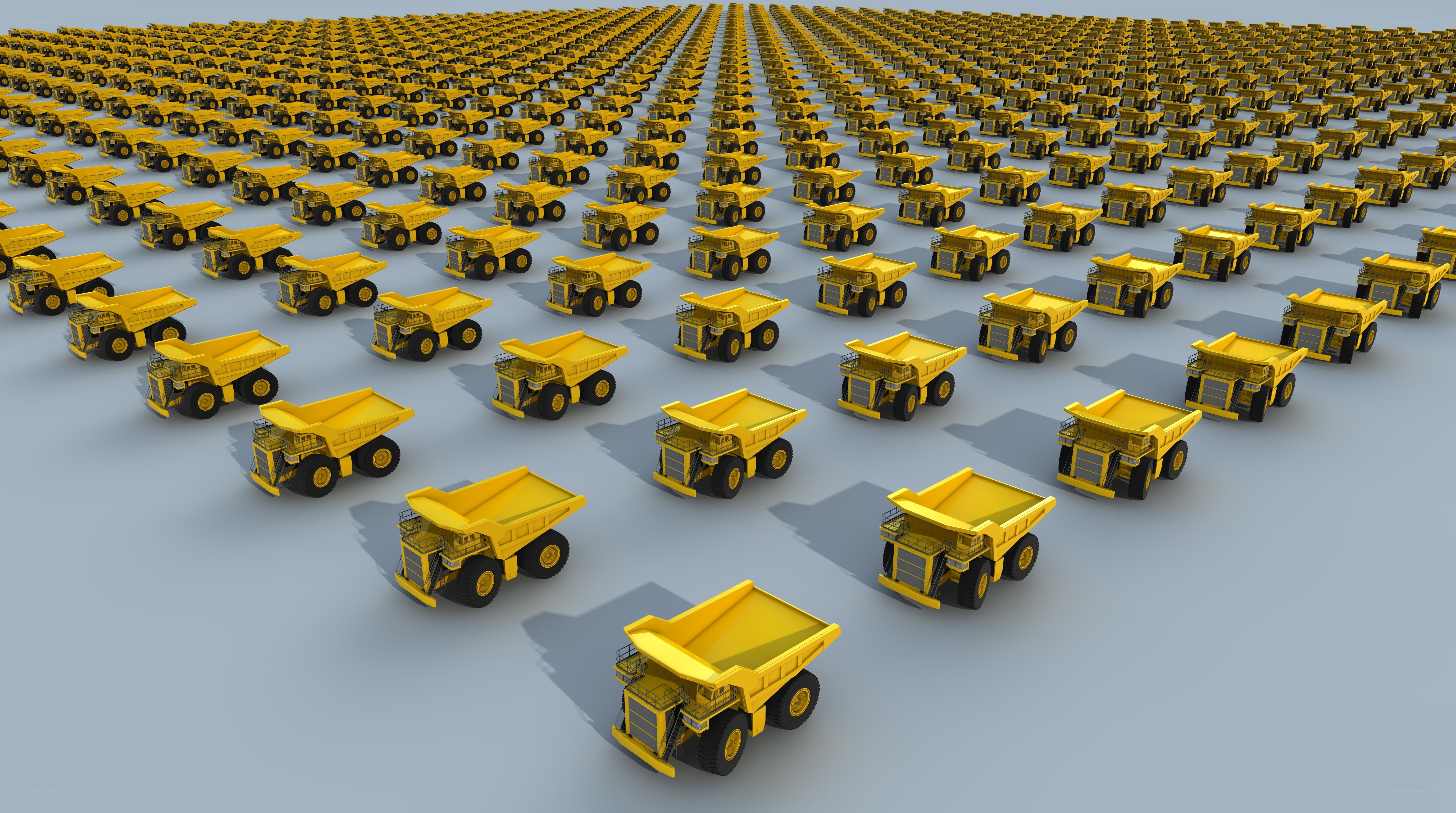 Rows of yellow mining trucks