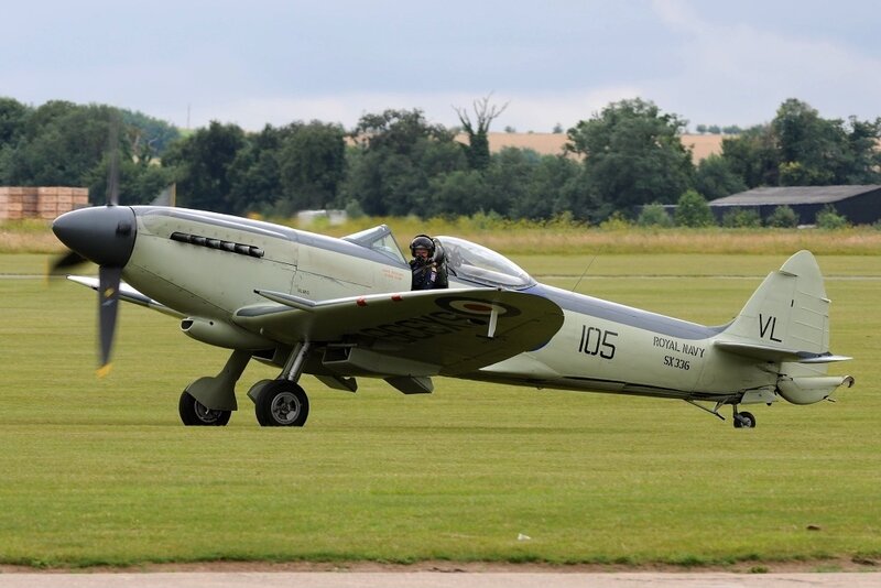 Royal Navy aircraft on grass field