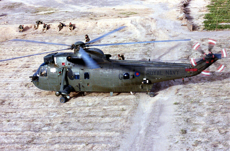 Royal Navy helicopter on desert terrain