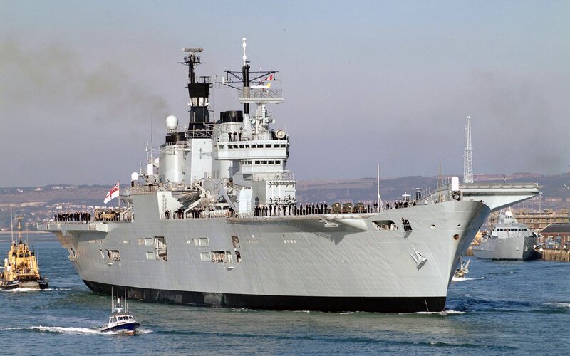 Royal Navy ship in harbor