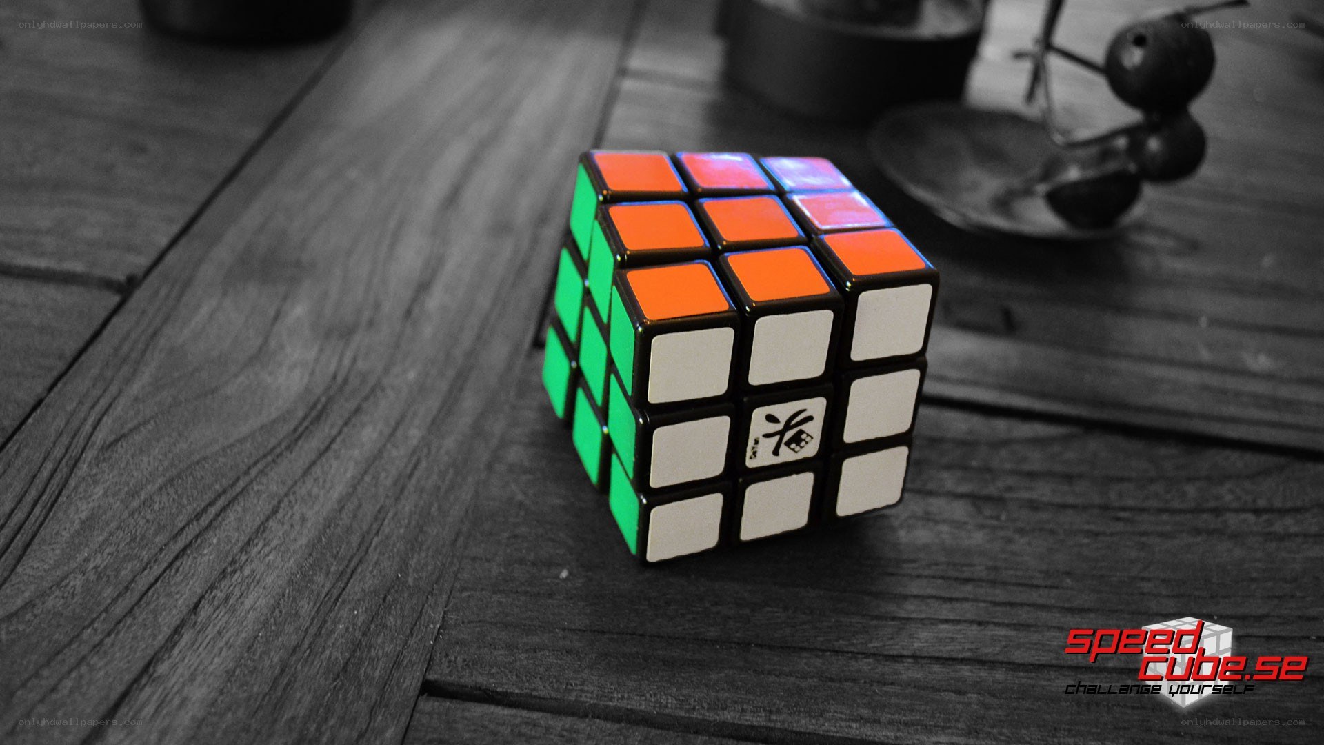 Rubik's cube on wooden table