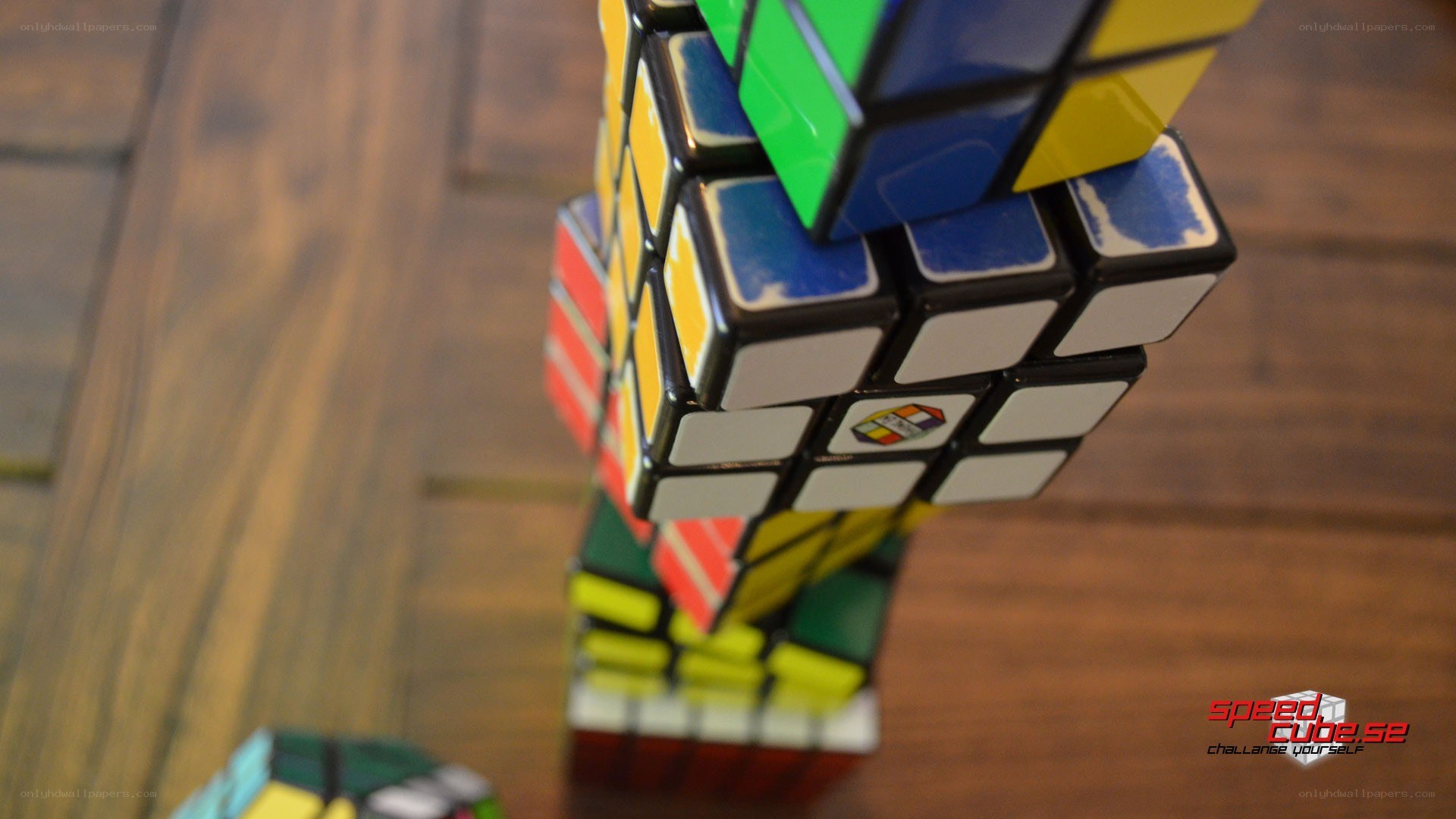 Rubik's cube tower on wood