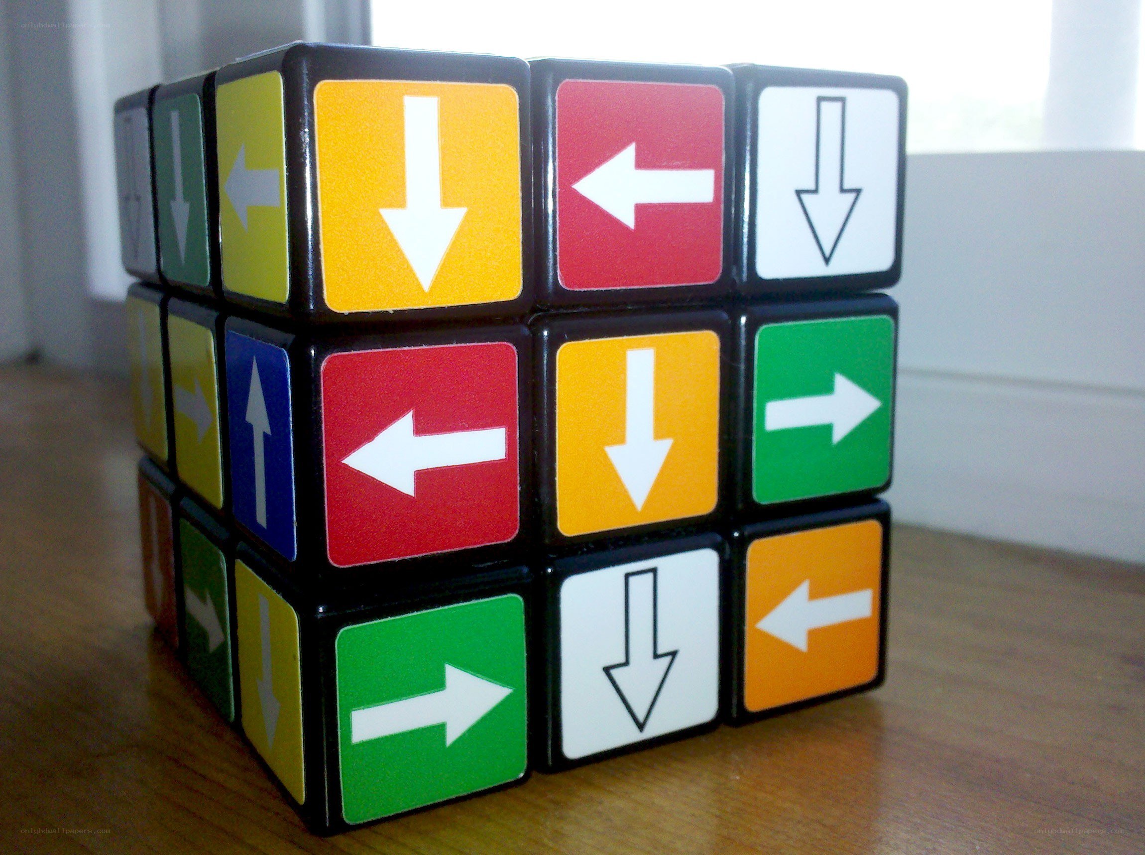 Rubik's cube with arrow symbols