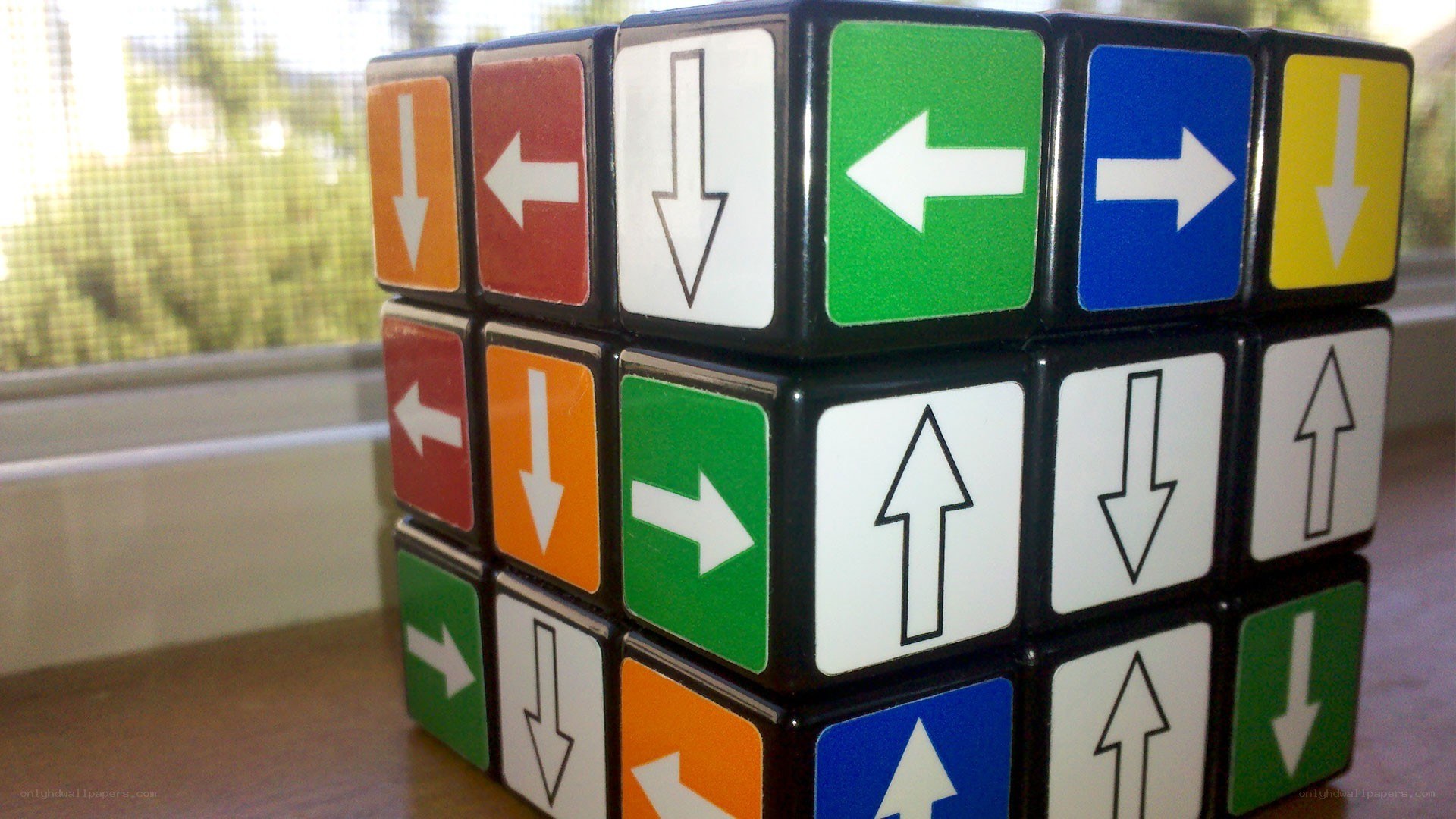 Rubik's cube with arrow symbols