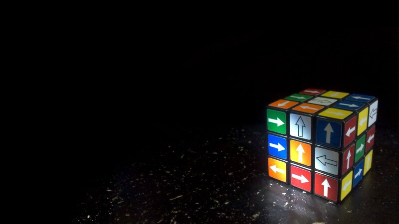 Rubik's cube with arrow symbols