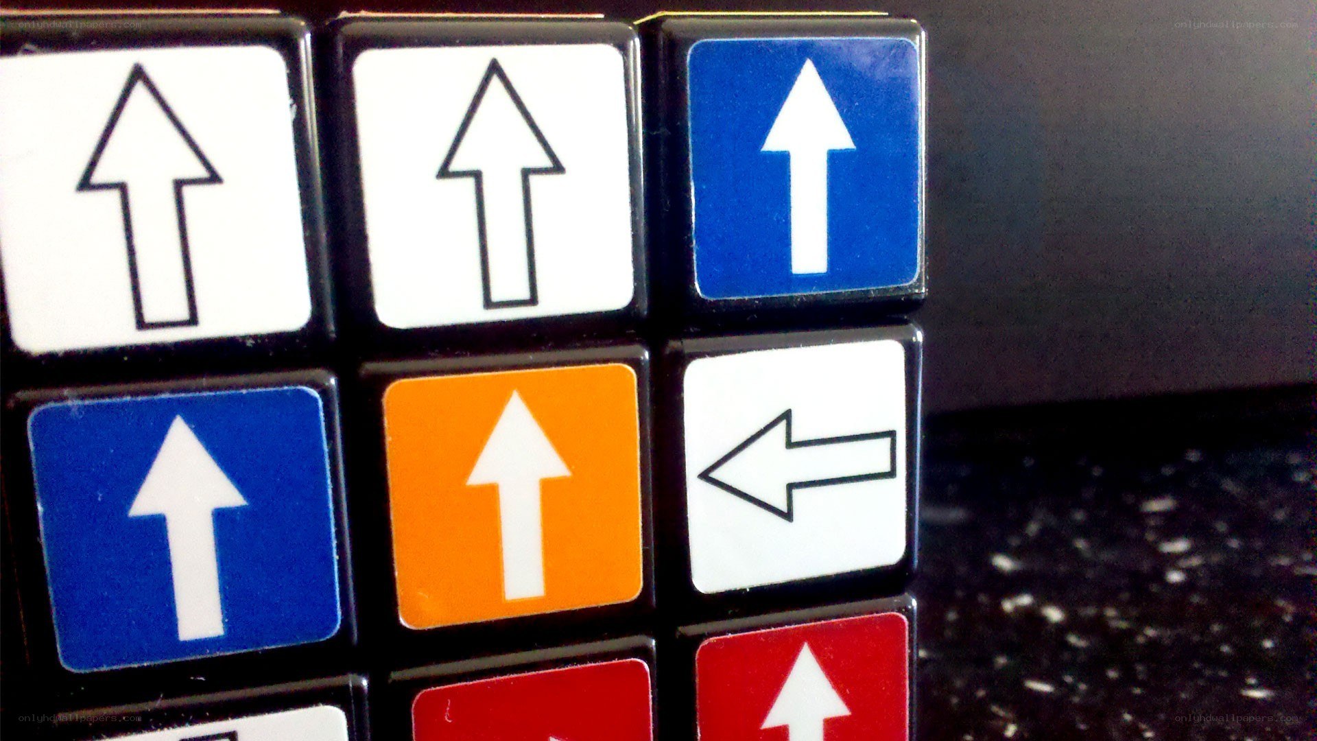 Rubik's cube with arrow symbols