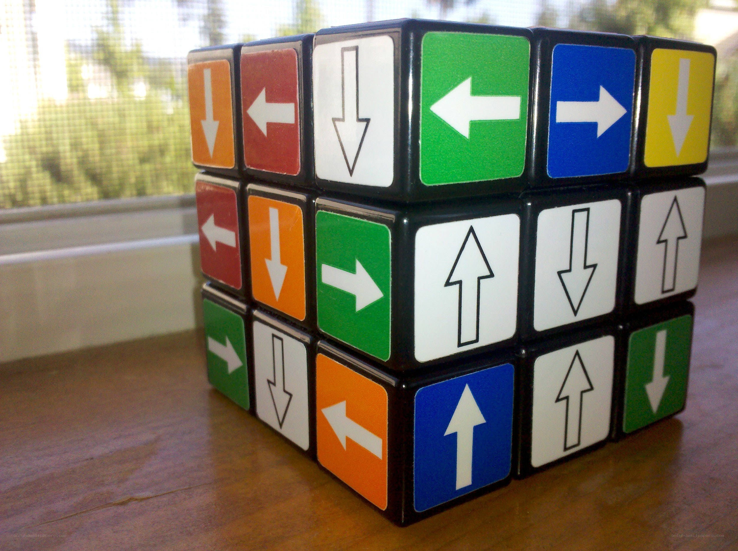 Rubik's cube with directional arrows