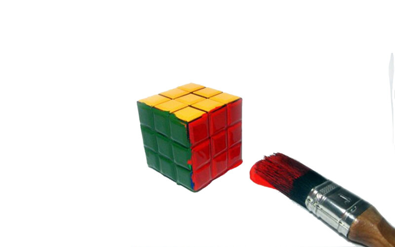 Rubik's cube with paintbrush
