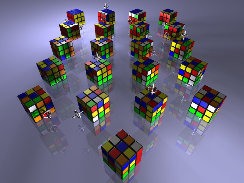Rubik's cubes on reflective surface