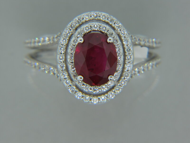 Ruby and diamond halo ring