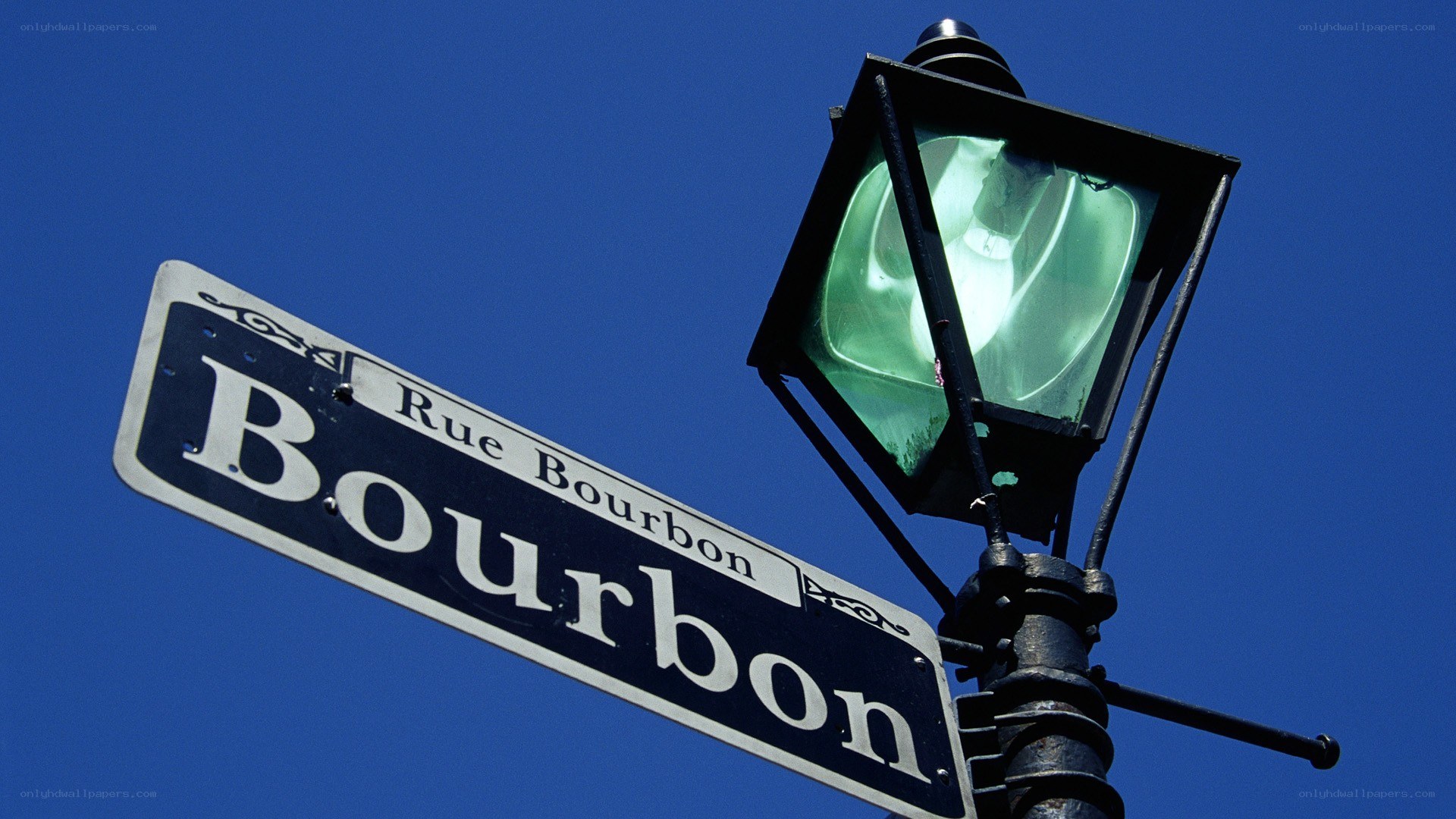 Rue Bourbon street sign