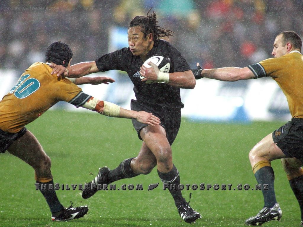 Rugby player running with ball