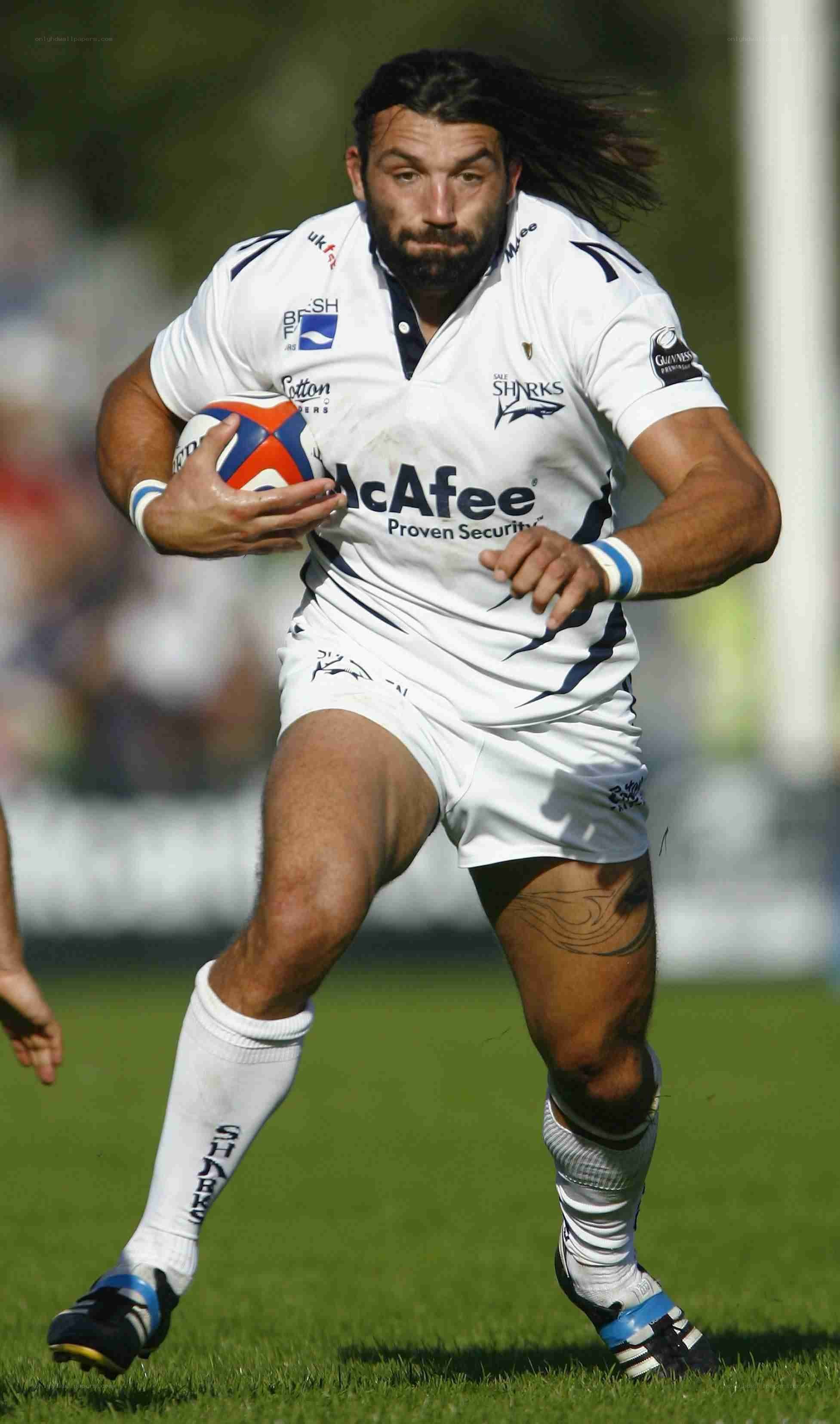 rugby player running with ball