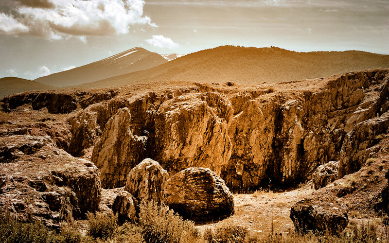 Rugged canyon under golden sky
