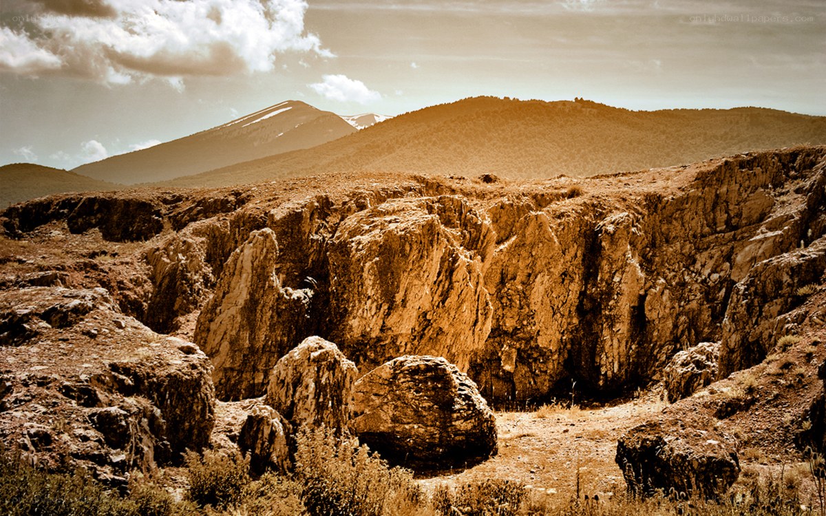 Rugged canyon under golden sky