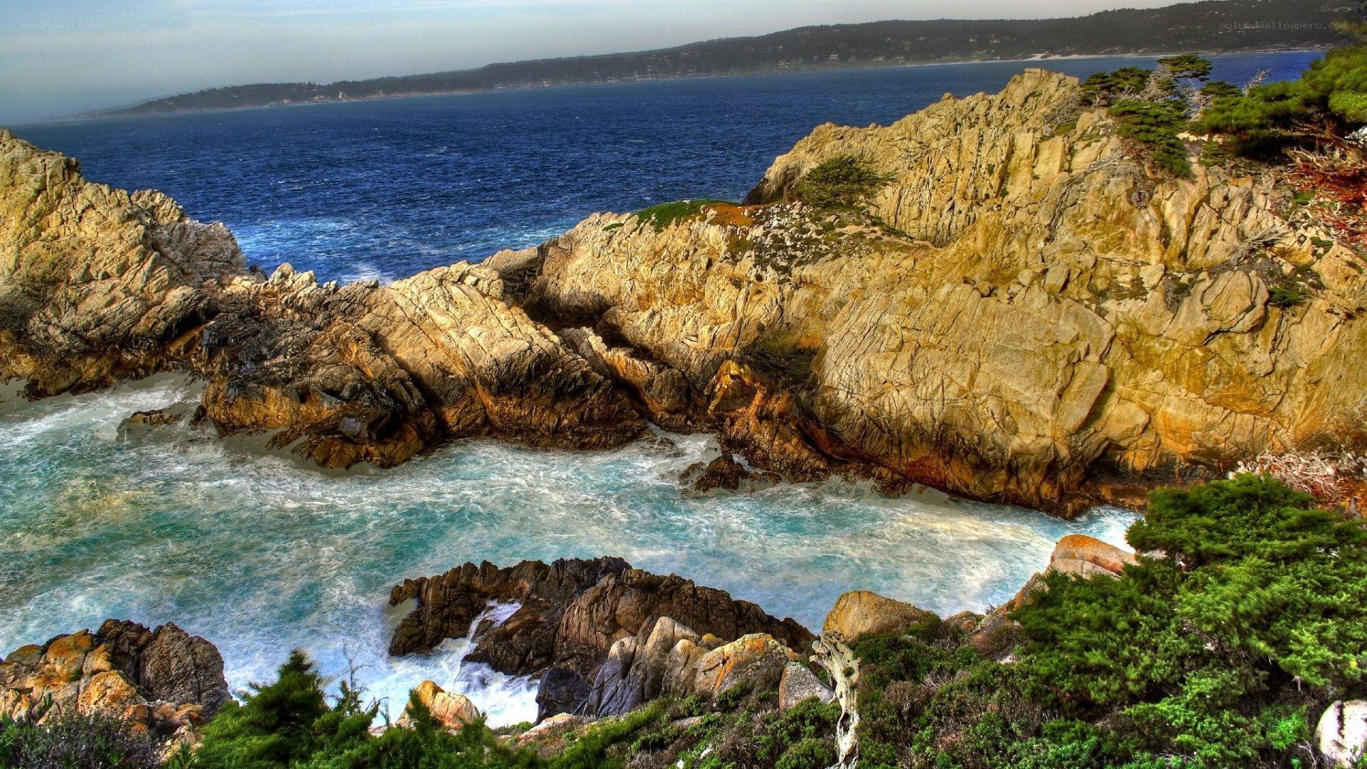 Rugged coastal cliffs and ocean waves
