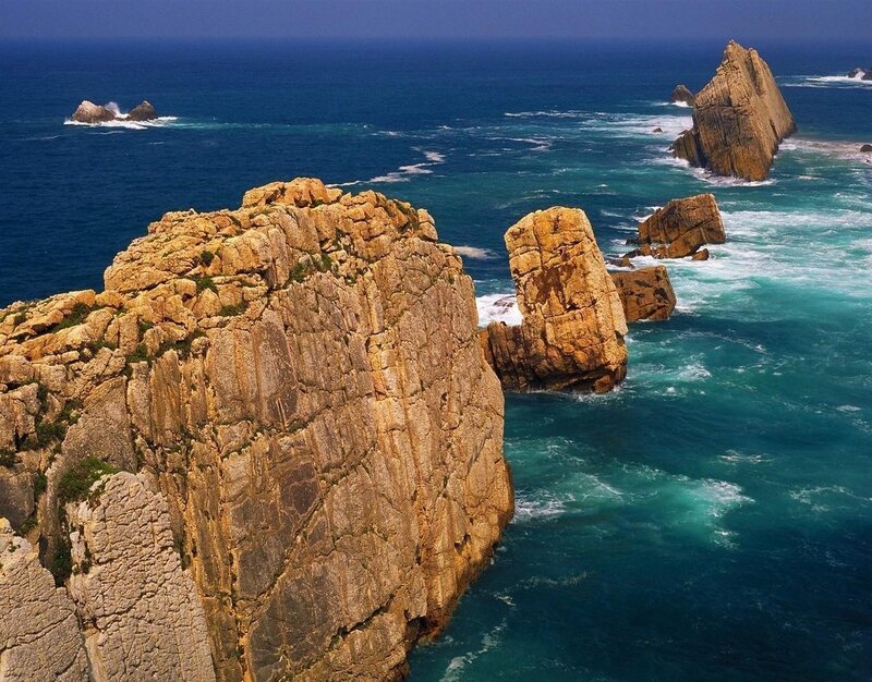 Rugged coastal cliffs and sea stacks
