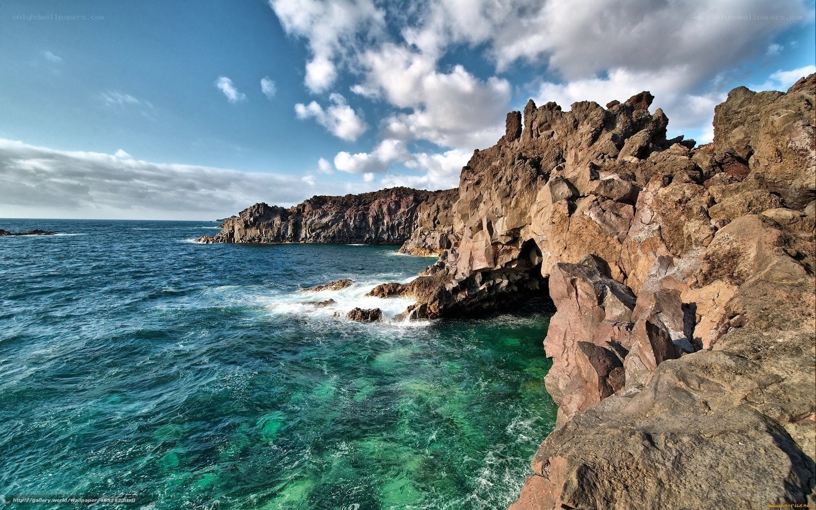 Rugged coastal cliffs and turquoise sea