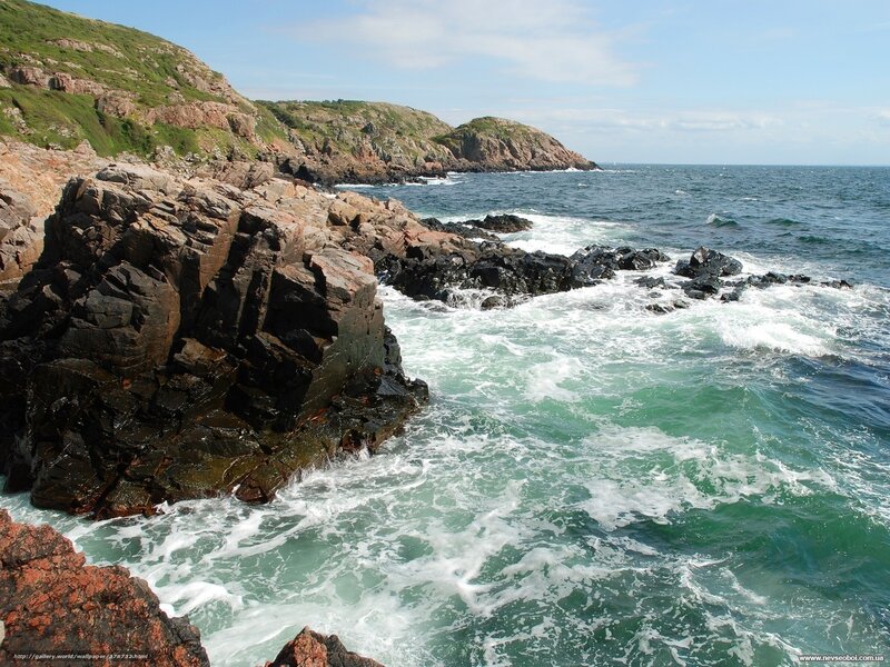 Rugged coastal cliffs and waves