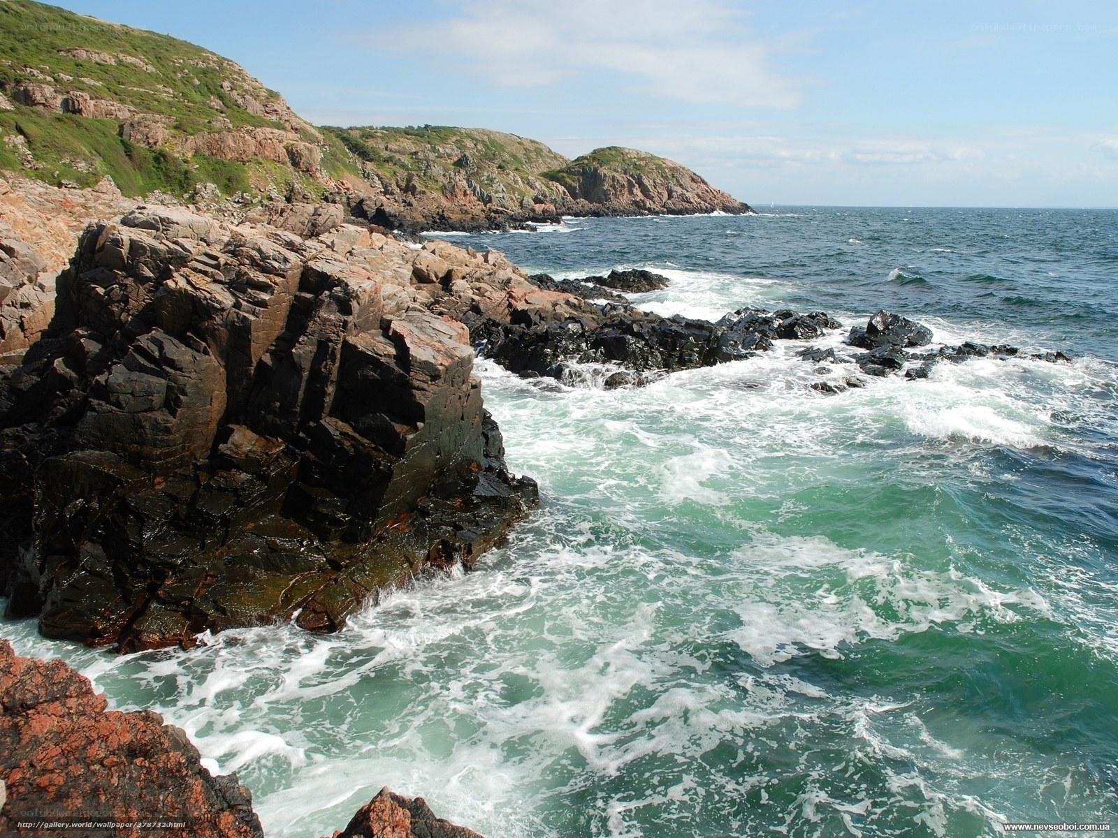 Rugged coastal cliffs and waves
