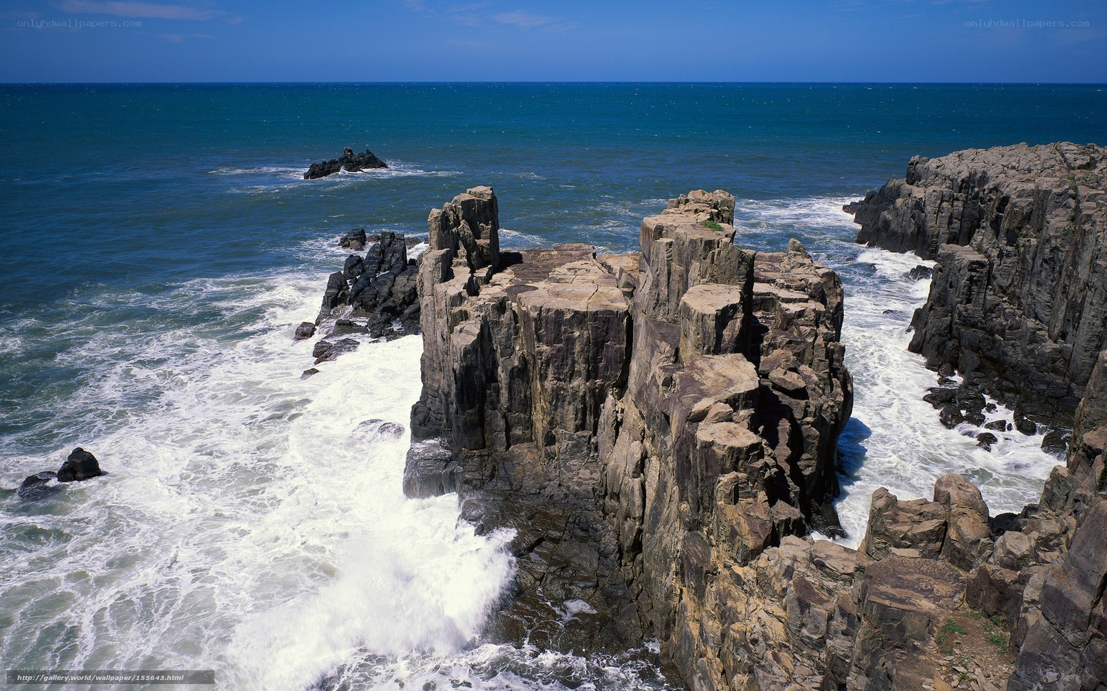 Rugged coastal cliffs and waves