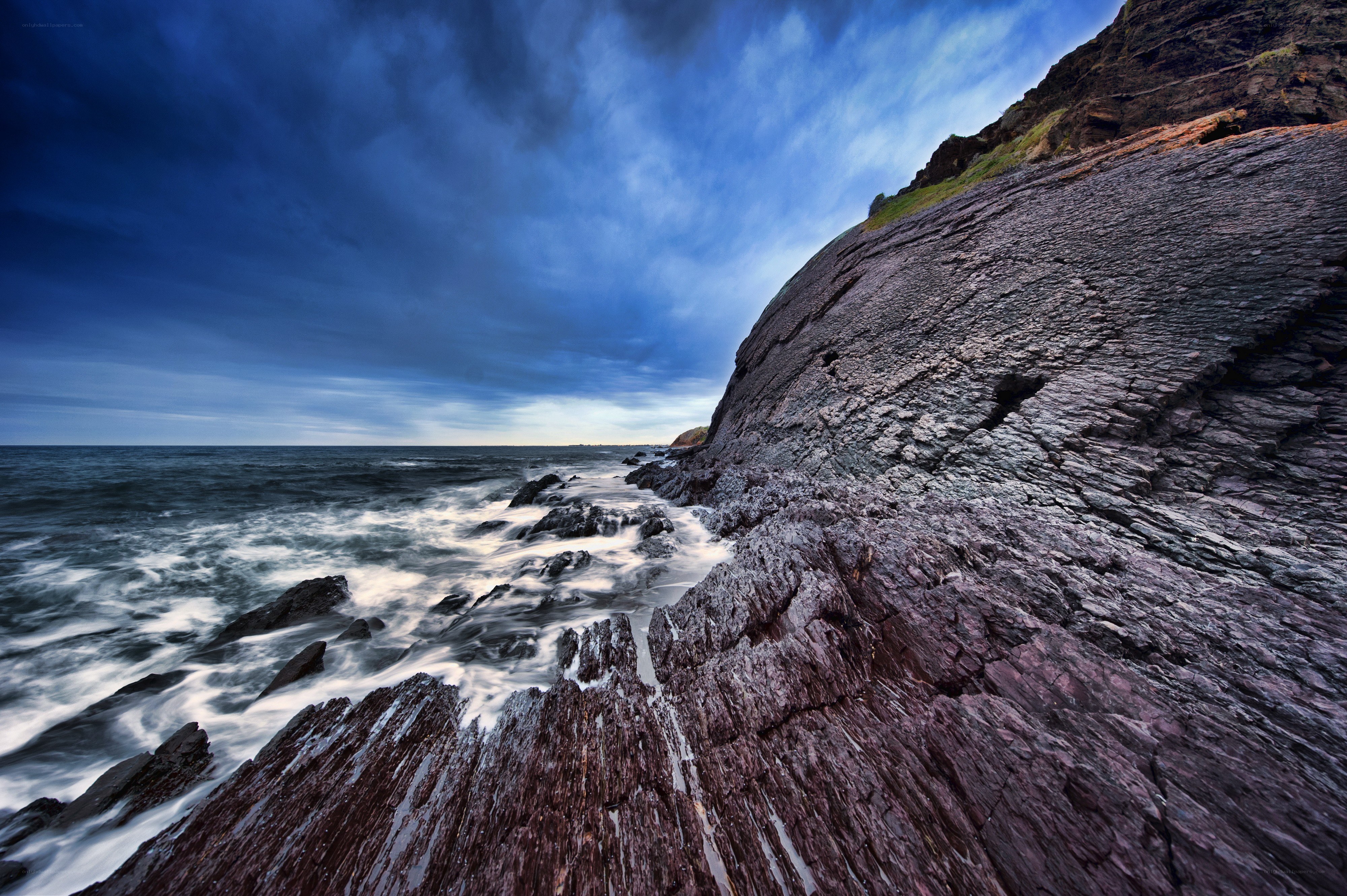 Rugged coastal cliffs at dusk