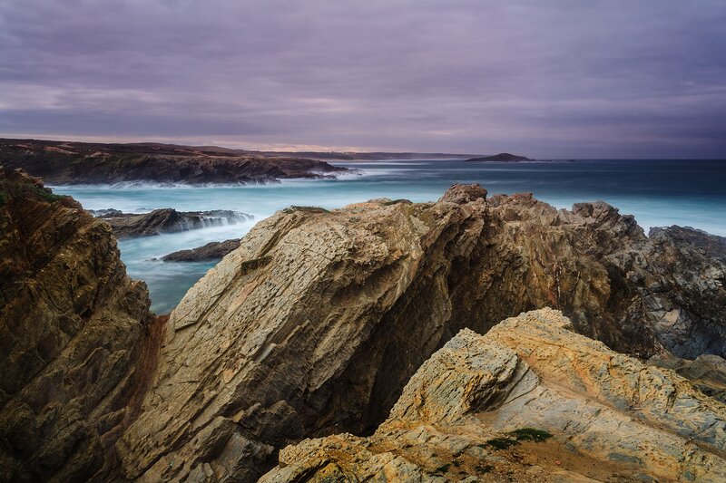 Rugged coastal cliffs at dusk