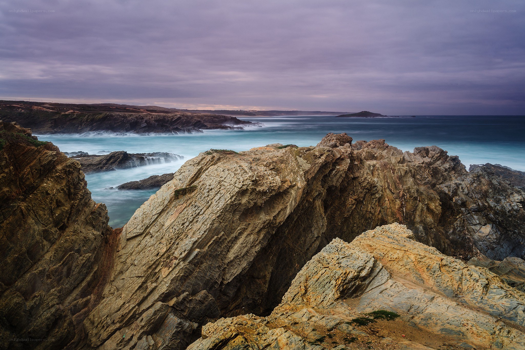 Rugged coastal cliffs at dusk