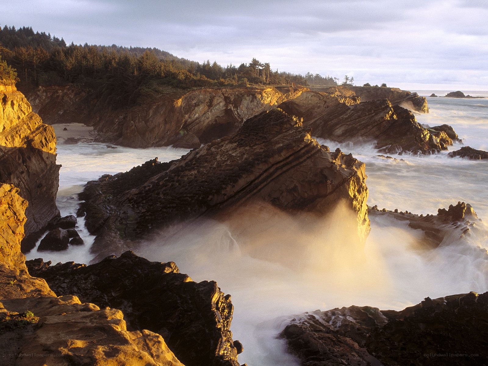 Rugged coastal cliffs at sunset