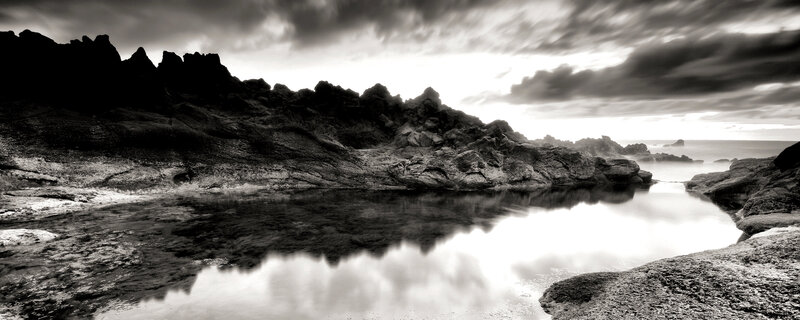 Rugged coastal landscape at dusk
