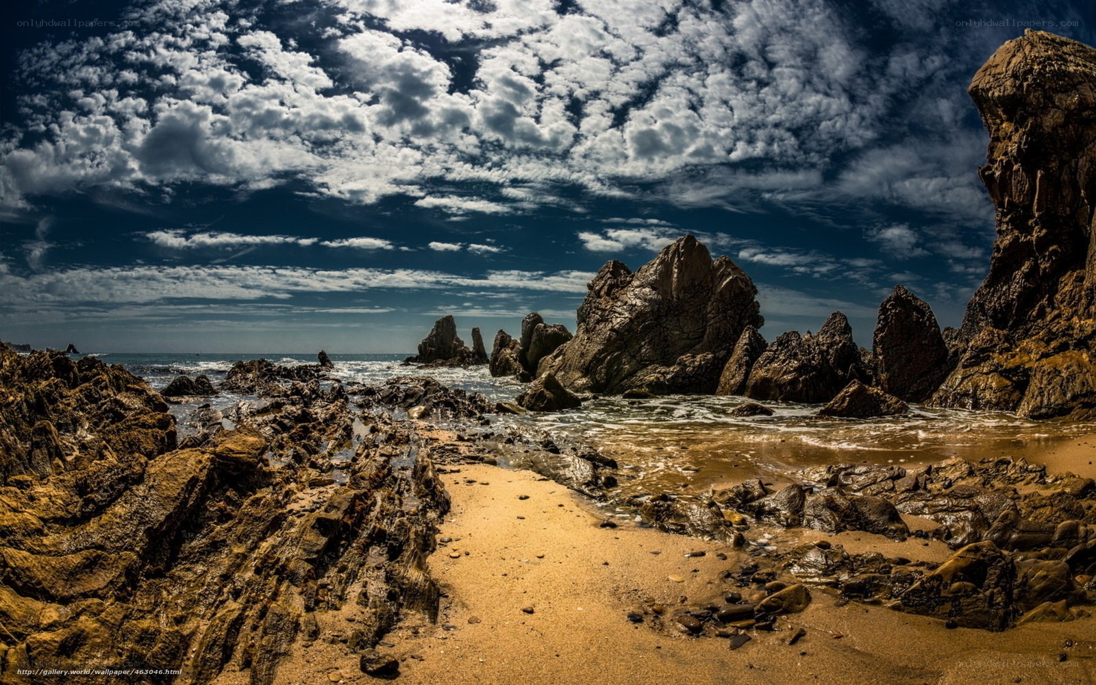 Rugged coastal rocks and sky