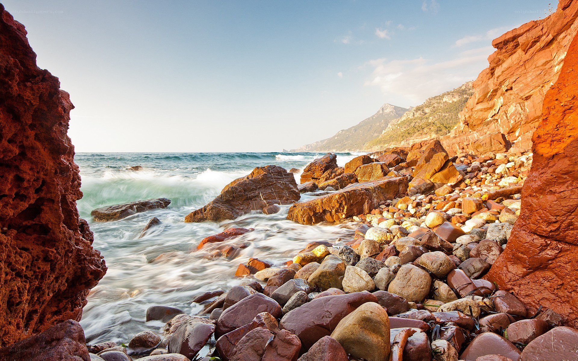 Rugged coastal rocks and waves